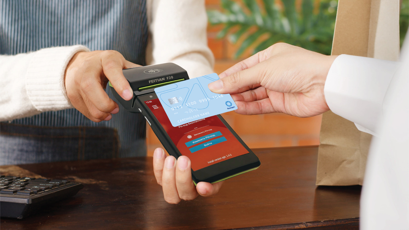 A person paying with a credit card